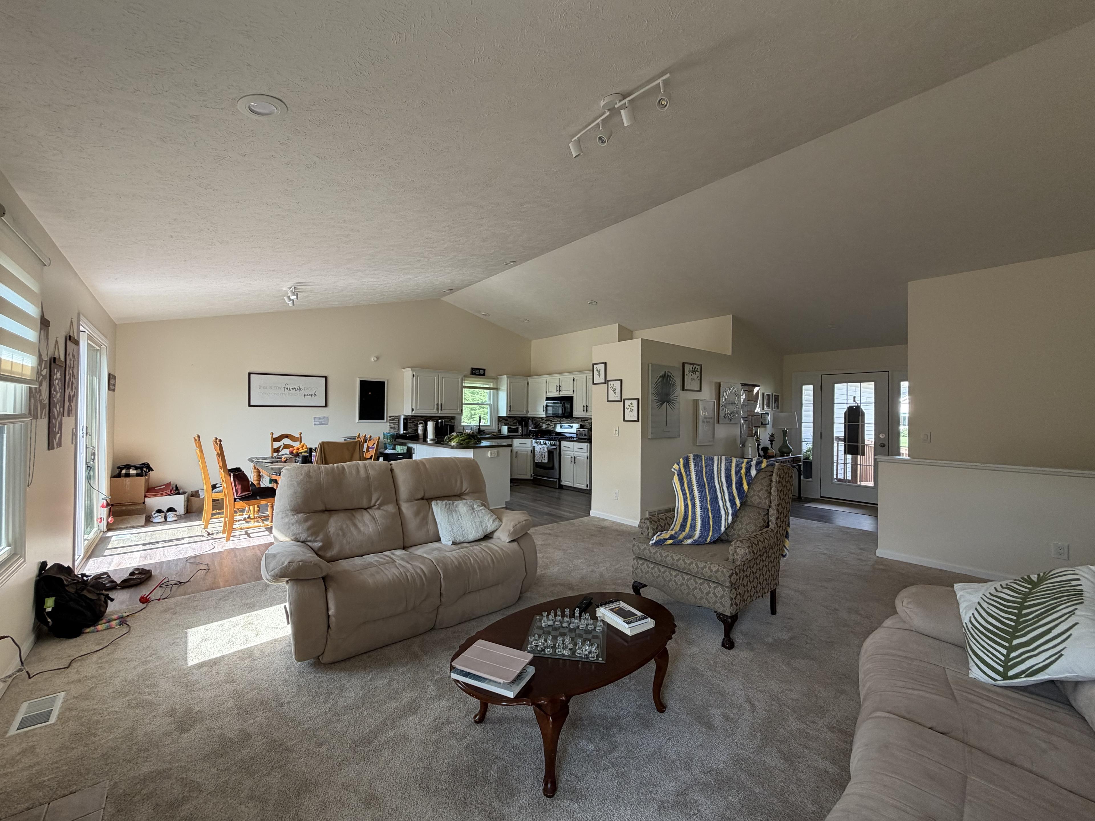 Open living area looking through to the kitchen and dining table