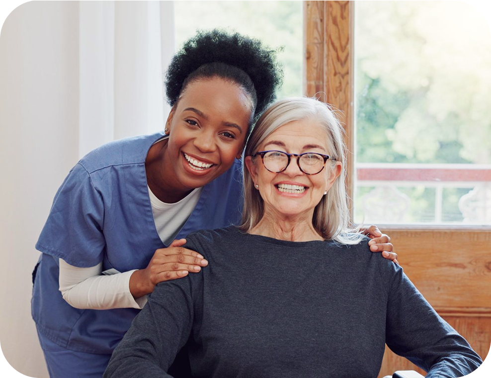 A nurse sharing a joyful moment with a resident